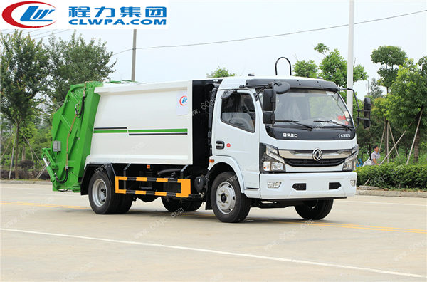 國六東風(fēng)凱普特壓縮垃圾車交付煙臺(tái)某鄉(xiāng)村居委會(huì)